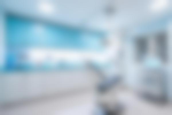 周学东医生：乐山英美牙科42年经验口腔，专注根管治疗与牙周健康